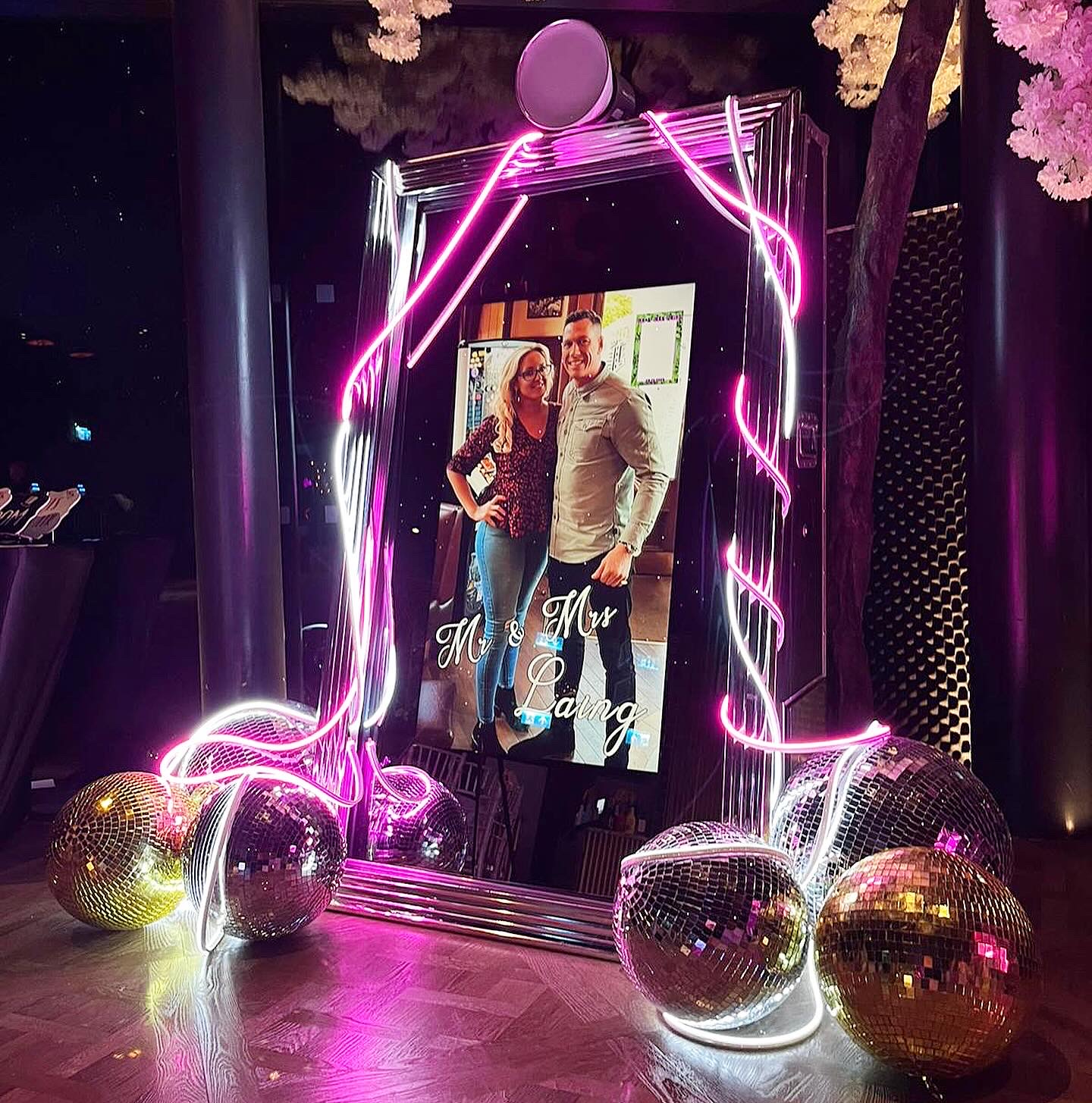 Silver Frame, Disco Ball and White and Pink Neon